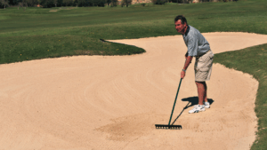 is golf etiquette raking a bunker?